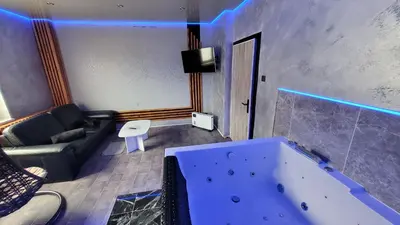 Ein Sitzbereich in der Unterkunft Wellness Suite mit Whirlpool & Sauna