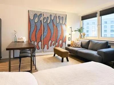 Ein Bett oder Betten in einem Zimmer der Unterkunft Schöne Ferienwohnung im Zentrum mit Self Check-In und Free Wifi