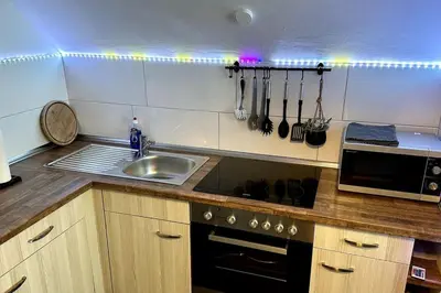 Küche/Küchenzeile in der Unterkunft Schickes 2-Zimmer Appartement Messe Rü Innenstadt