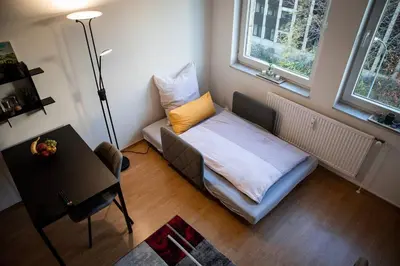 Ein Bett oder Betten in einem Zimmer der Unterkunft Loftcharakter auf 2 Etagen - Zentral in Essen!