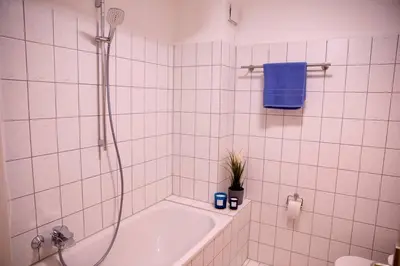 Ein Badezimmer in der Unterkunft Stilvolles Apartment - Messe Rü Innenstadt