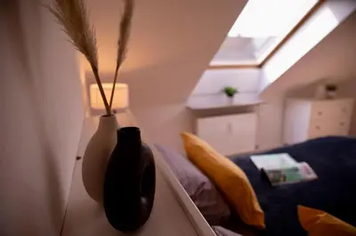 Ein Bett oder Betten in einem Zimmer der Unterkunft Stilvolles Apartment - Messe Rü Innenstadt