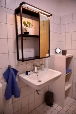Ein Badezimmer in der Unterkunft Stilvolles Apartment - Messe Rü Innenstadt