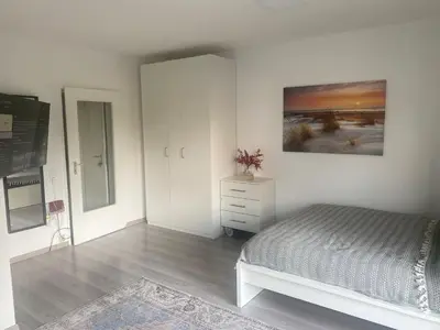 Ein Bett oder Betten in einem Zimmer der Unterkunft Gemütliches Zuhause in 1A Lage