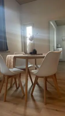 Ein Sitzbereich in der Unterkunft Cozy Apartment Blume