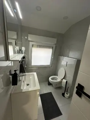 Ein Badezimmer in der Unterkunft Moparts