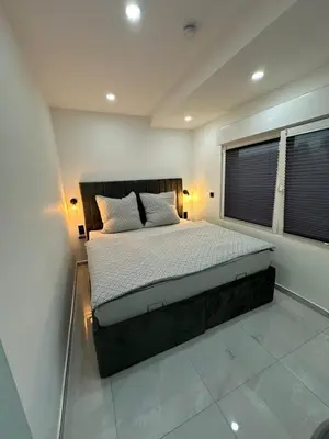 Ein Bett oder Betten in einem Zimmer der Unterkunft Moparts