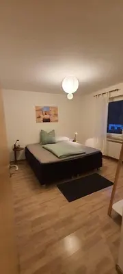 Ein Bett oder Betten in einem Zimmer der Unterkunft Ferienwohnung Hansi