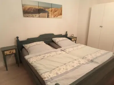 Ein Bett oder Betten in einem Zimmer der Unterkunft Ferienwohnung Hansi