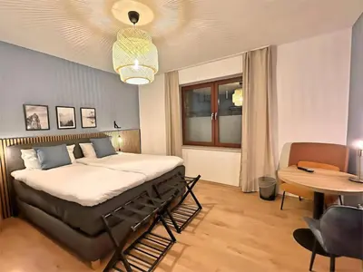Ein Bett oder Betten in einem Zimmer der Unterkunft Urban & Chic: 2Bdr, Parkplatz