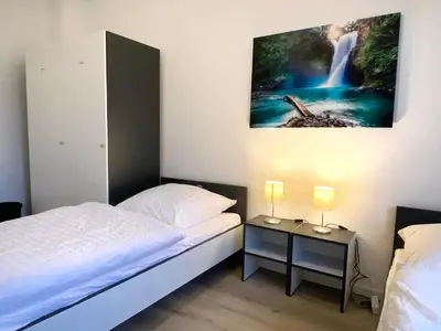 Ein Bett oder Betten in einem Zimmer der Unterkunft Meribu E1 Wohnung für Monteure und Arbeiter