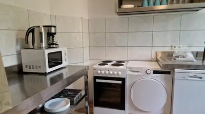 Küche/Küchenzeile in der Unterkunft Meribu E1 Wohnung für Monteure und Arbeiter