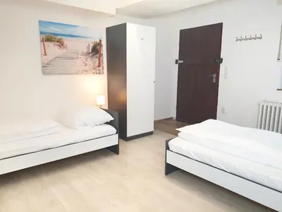 Ein Bett oder Betten in einem Zimmer der Unterkunft Meribu H1 Wohnung für Monteure und Arbeiter