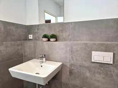 Ein Badezimmer in der Unterkunft Meribu H1 Wohnung für Monteure und Arbeiter