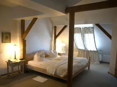 Ein Bett oder Betten in einem Zimmer der Unterkunft Hotel Stadt Hamm