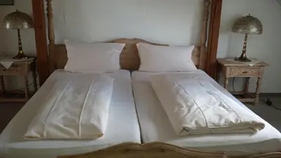 Ein Bett oder Betten in einem Zimmer der Unterkunft Hotel Stadt Hamm