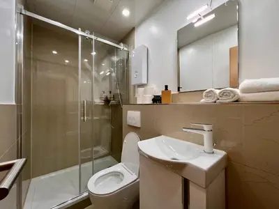 Ein Badezimmer in der Unterkunft PrimeTime Suite für 2 mit Küche