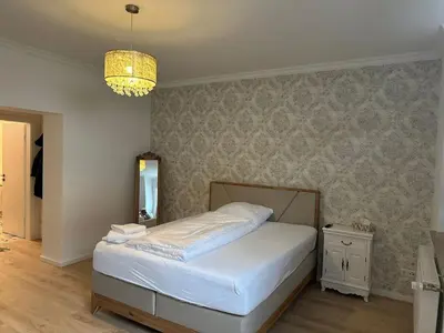 Ein Bett oder Betten in einem Zimmer der Unterkunft Paris: Messe-, Business-, Ferienwohnung