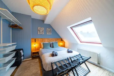 Ein Bett oder Betten in einem Zimmer der Unterkunft Über den Dächern von Witten bis 6P