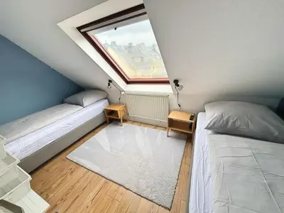 Ein Bett oder Betten in einem Zimmer der Unterkunft Über den Dächern von Witten bis 6P