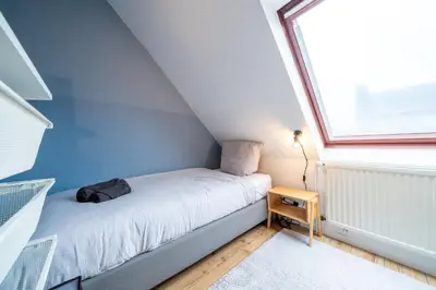 Ein Bett oder Betten in einem Zimmer der Unterkunft Über den Dächern von Witten bis 6P