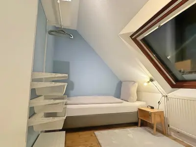 Ein Bett oder Betten in einem Zimmer der Unterkunft Über den Dächern von Witten bis 6P