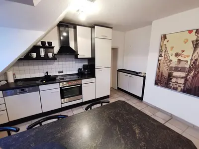 Küche/Küchenzeile in der Unterkunft Helle Maisonnette Wohnung Penthouse