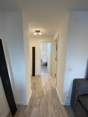 Ein Bett oder Betten in einem Zimmer der Unterkunft New York: Messe-, Business-, Ferienwohnung