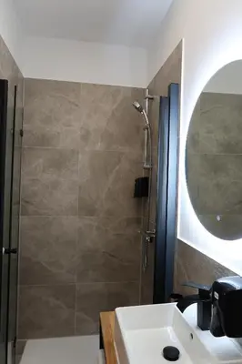 Ein Badezimmer in der Unterkunft TOKA ROOMS - an der Regiobahn