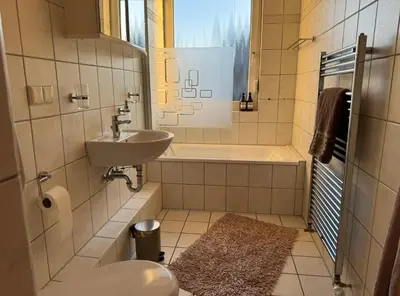 Ein Badezimmer in der Unterkunft Ruhrpott Residenz - 3 Zimmer Suite - 70qm mit Balkon