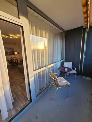 Ein Sitzbereich in der Unterkunft FEWO FAUBEL Mülheim Forum City 60 m2 inclusive Garagenstellplatz