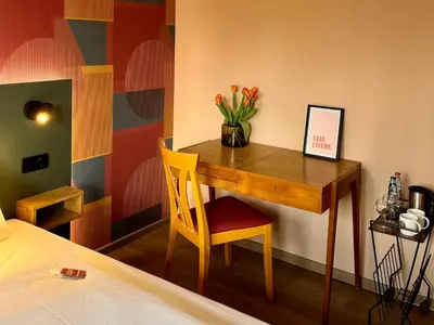 Ein Bett oder Betten in einem Zimmer der Unterkunft Kloster-Quartier