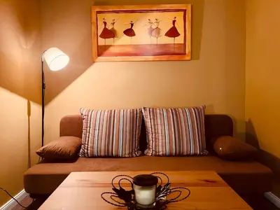 Ein Sitzbereich in der Unterkunft Terracotta Apartment - Zentral, Parken, Netflix, Kontaktloses Einchecken, Kingsize-Bett