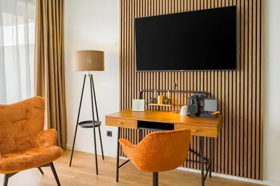 TV/Unterhaltungsangebot in der Unterkunft Aspire Palais Recklinghausen, Trademark Collection by Wyndham