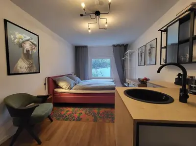Ein Bett oder Betten in einem Zimmer der Unterkunft Ruhiges Apartment & Veranda mit guter Anbindung