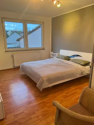 Ein Bett oder Betten in einem Zimmer der Unterkunft Gemütliche Ferien-/Monteurenwohnung in Herne