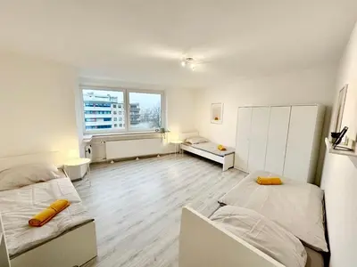 Ein Bett oder Betten in einem Zimmer der Unterkunft Cozy Apartment in Wuppertal