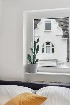 Ein Bett oder Betten in einem Zimmer der Unterkunft Traumhaftes Apartment Zooviertel - Nähe DUS & Dortmund & Köln & Essen