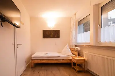 Ein Bett oder Betten in einem Zimmer der Unterkunft Hotel Hervest
