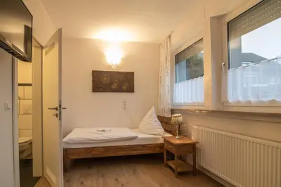 Ein Bett oder Betten in einem Zimmer der Unterkunft Hotel Hervest