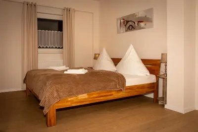 Ein Bett oder Betten in einem Zimmer der Unterkunft Hotel Hervest