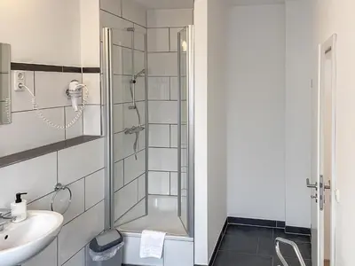 Ein Badezimmer in der Unterkunft Hotel Hervest