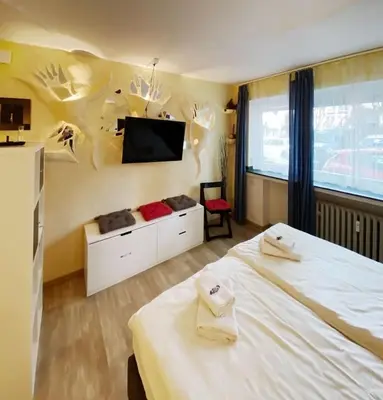 Ein Bett oder Betten in einem Zimmer der Unterkunft Apartments Essen-Rüttenscheid