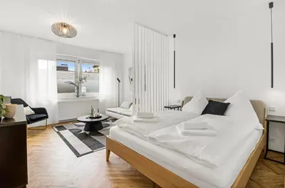 Ein Bett oder Betten in einem Zimmer der Unterkunft Gemütliches Apartment/ Ruhrpark