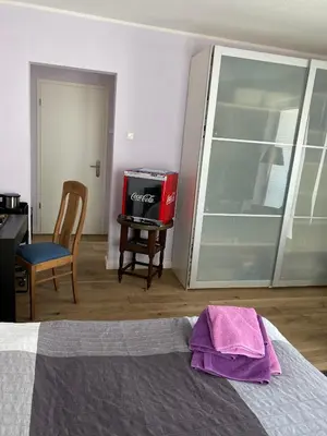 Ein Bett oder Betten in einem Zimmer der Unterkunft Zimmer am Bachlauf
