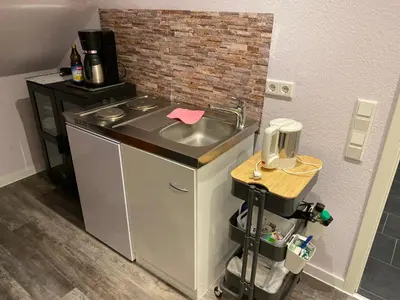 Küche/Küchenzeile in der Unterkunft Zimmer am Bachlauf