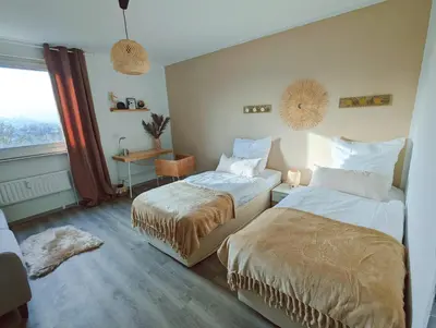 Ein Bett oder Betten in einem Zimmer der Unterkunft Wohnung mit Balkon und Aufzug