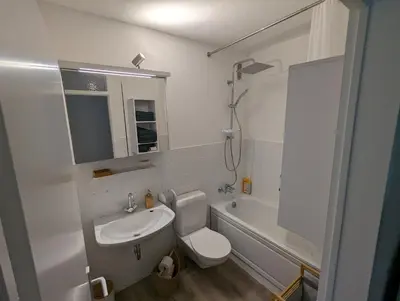 Ein Badezimmer in der Unterkunft Wohnung mit Balkon und Aufzug