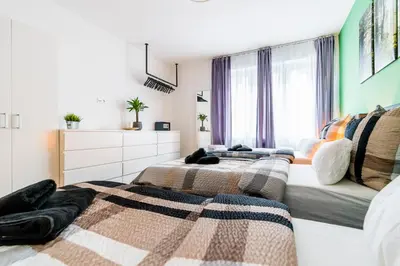 Ein Bett oder Betten in einem Zimmer der Unterkunft Centerapartments Marienstrasse
