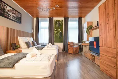Ein Bett oder Betten in einem Zimmer der Unterkunft Stylisches Stadtnest mit Xbox
